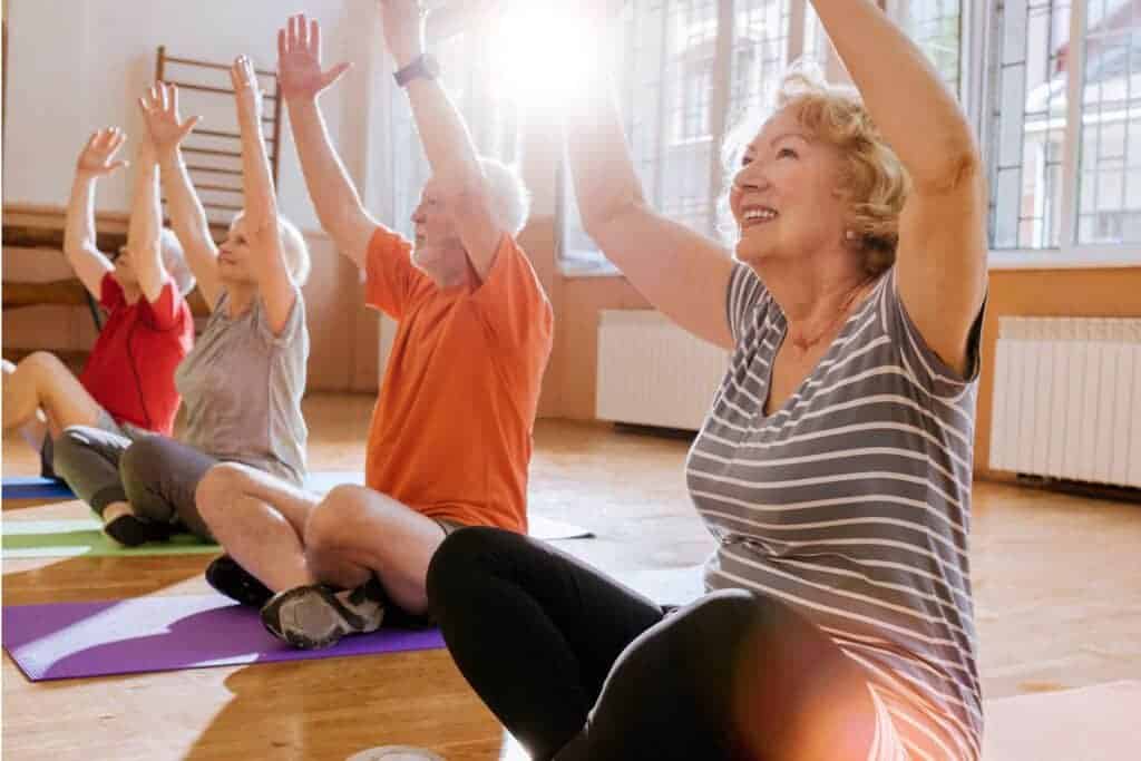 older adults doing yoga to exercise and prevent deep vein thrombosis