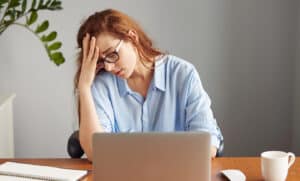 Woman stressed out at her job