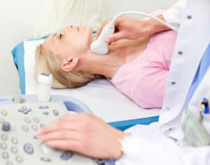 woman getting carotoid screening