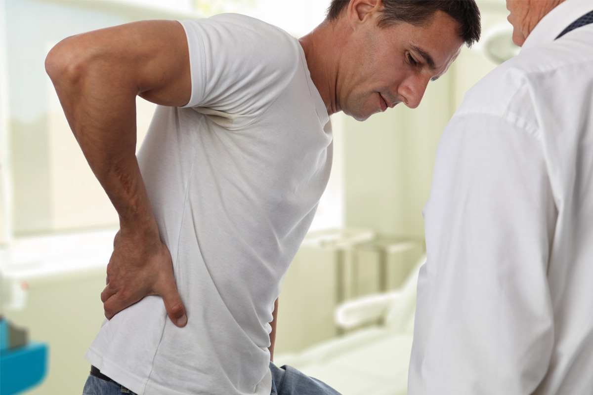 man having back pain