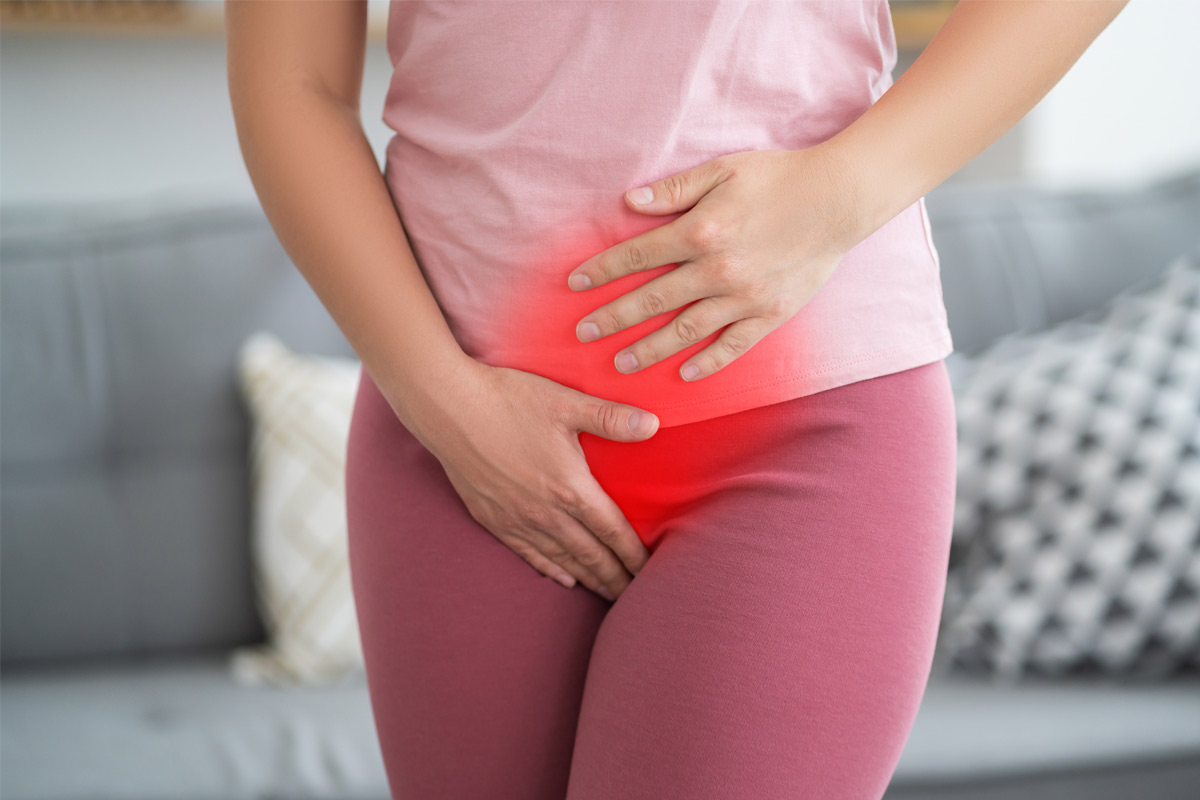 Women touching her lower stomach with red pain indication. 
