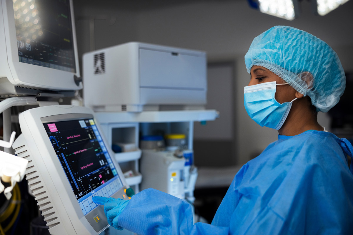 doctor checking a screen in a operation room. 
