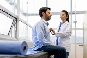 doctor checking patient in a clinic