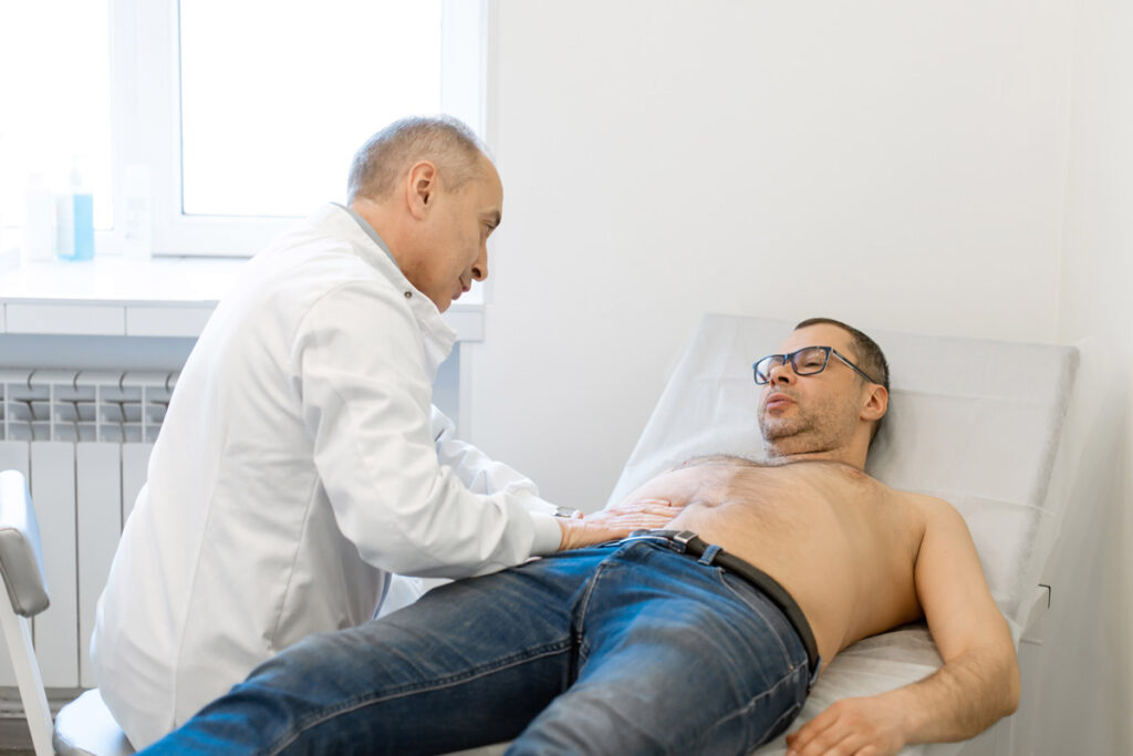 doctor checking patient