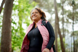 Woman walking outside in the woods