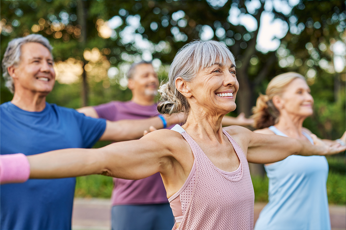People at an outdoor yoga class