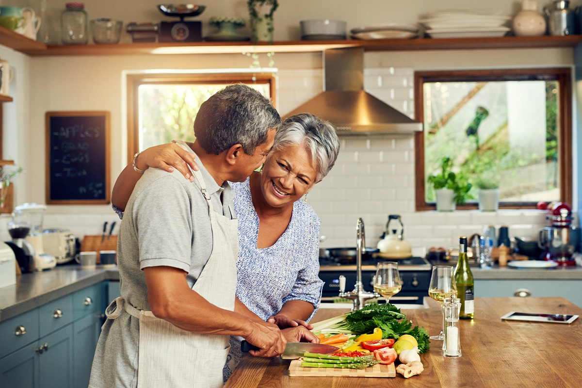 Older couple cooking in the kitchen