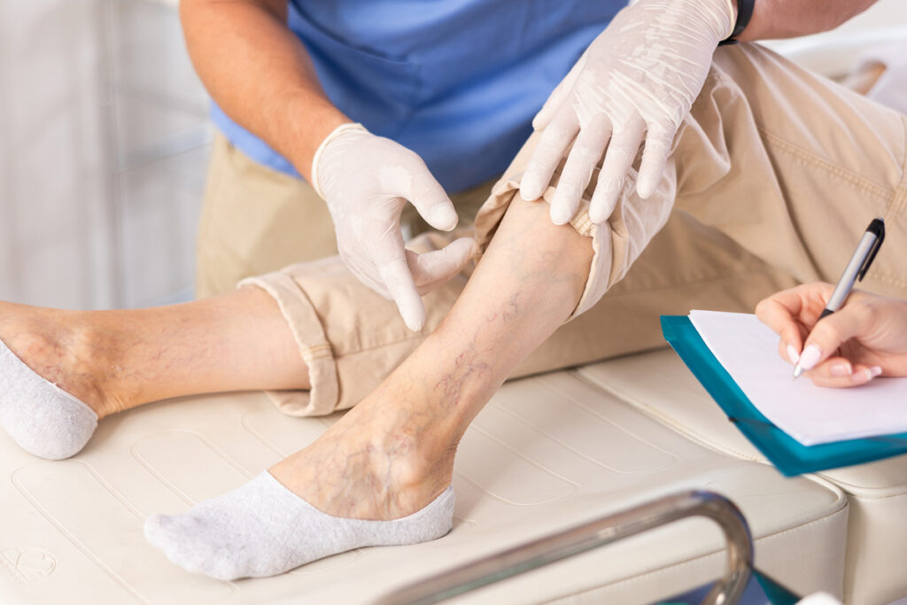 Doctor examines leg