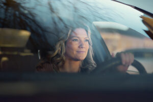 Destination medicine, woman driving in car