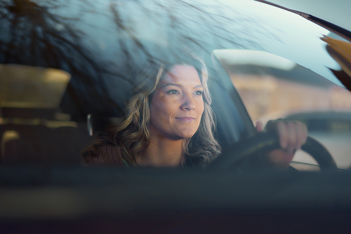 Destination medicine, woman driving in car
