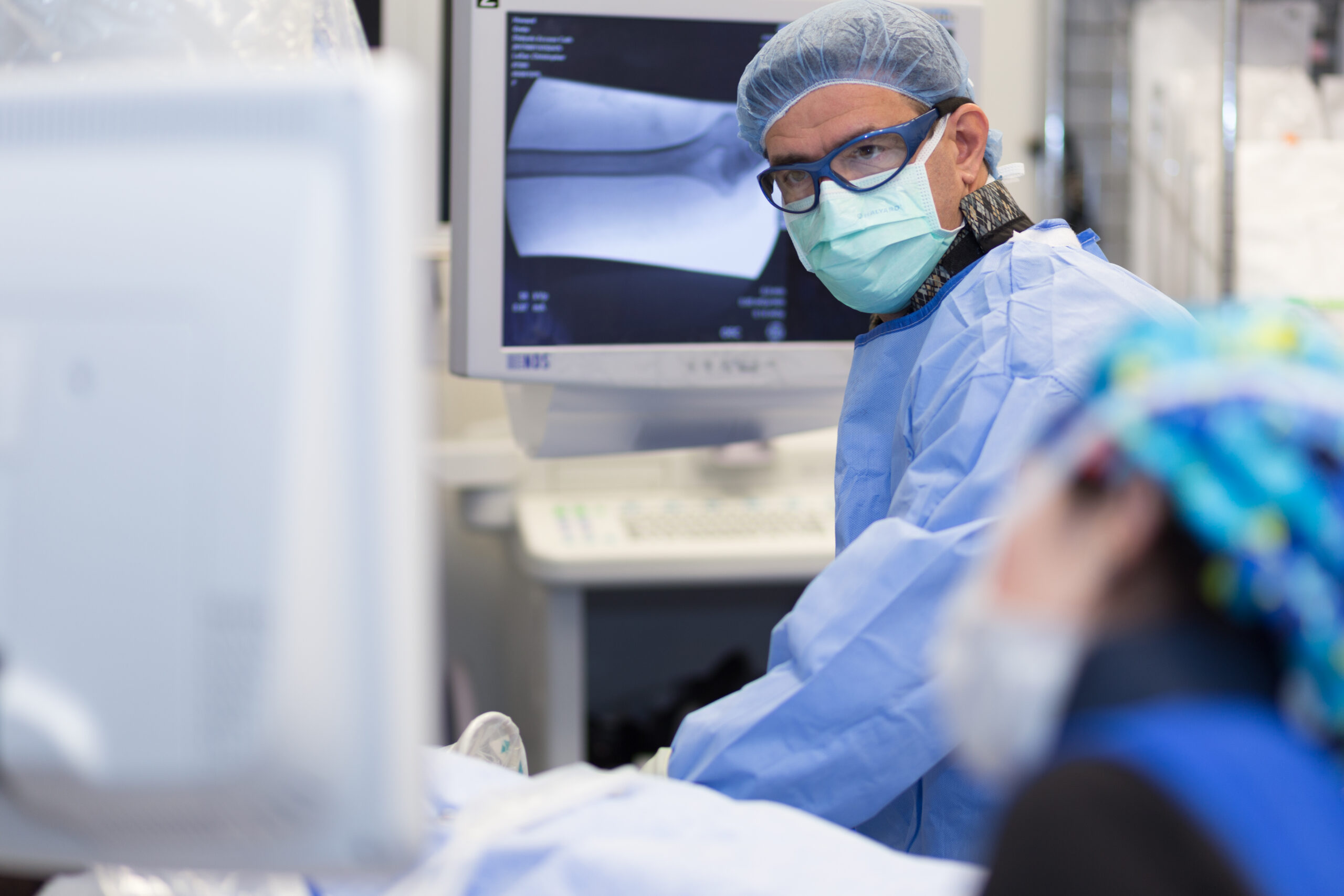 Surgeons checking equipment