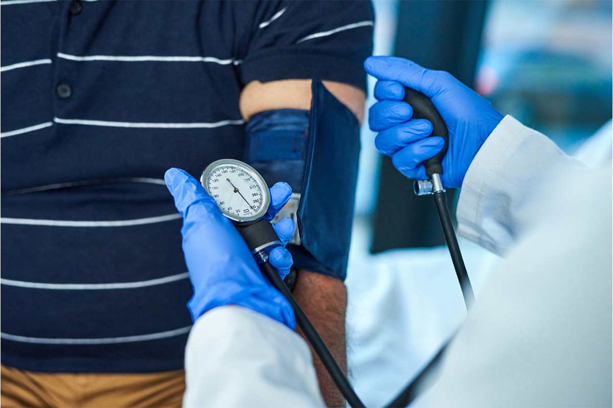 Doctor measuring blood pressure
